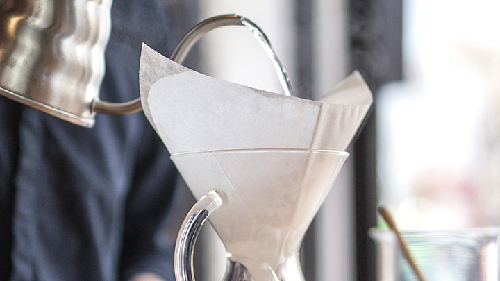 Rinse the filter and preheat the Chemex with hot water