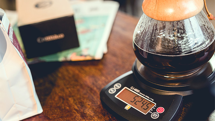 Use a kitchen scale to weigh both coffee and water (it's easiest in grams) to achieve your desired coffee-to-water ratio.